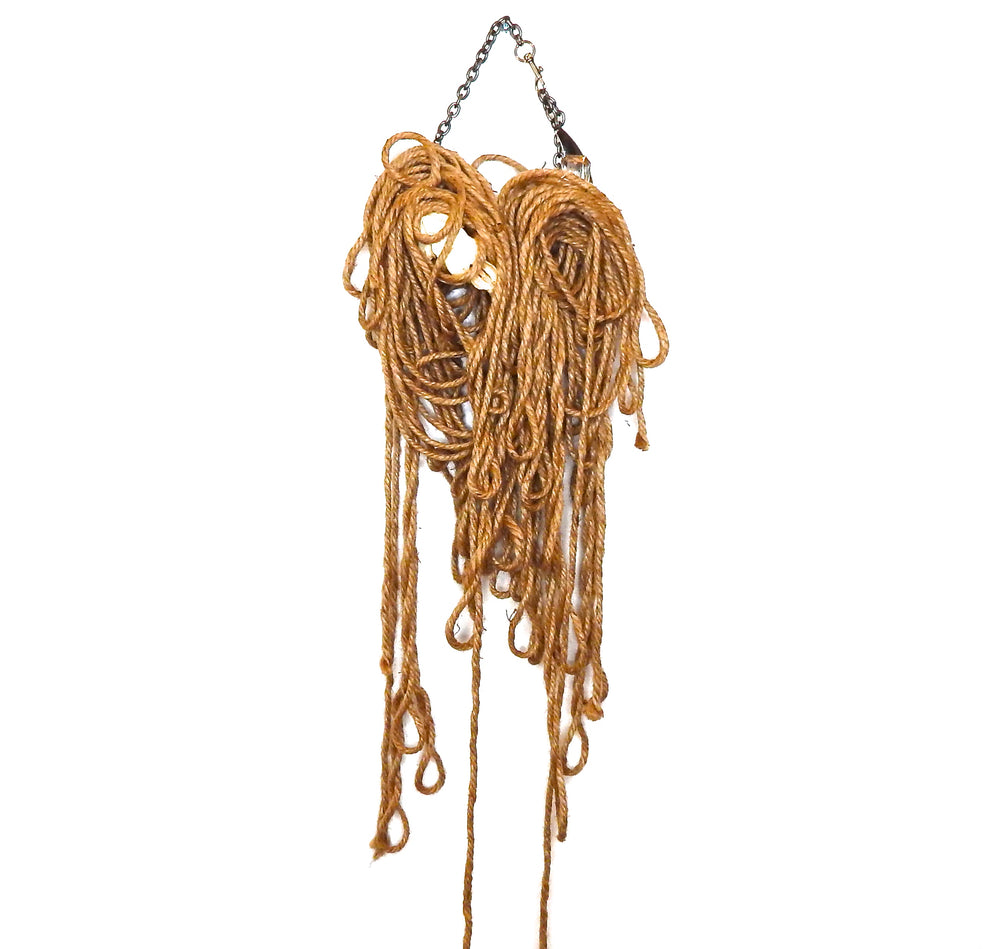 BOUND SKULL NECKLACE