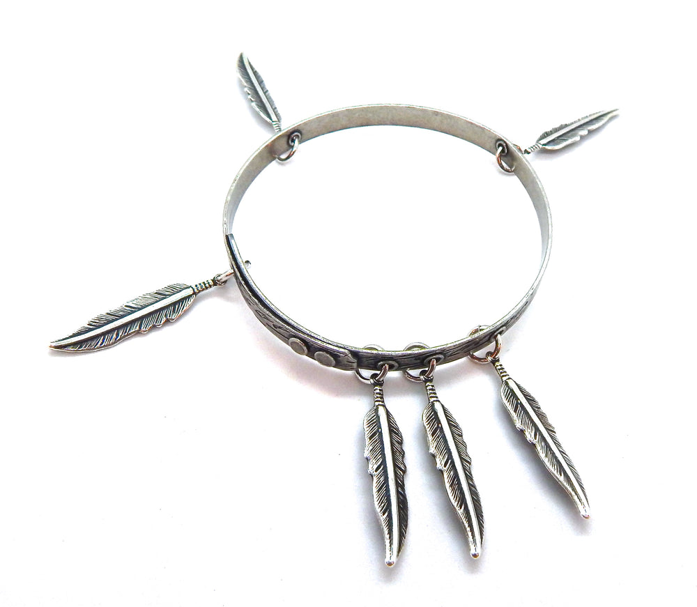 THUNDERBIRD LADYHAWKE SMALL FEATHER BANGLE (SILVER)