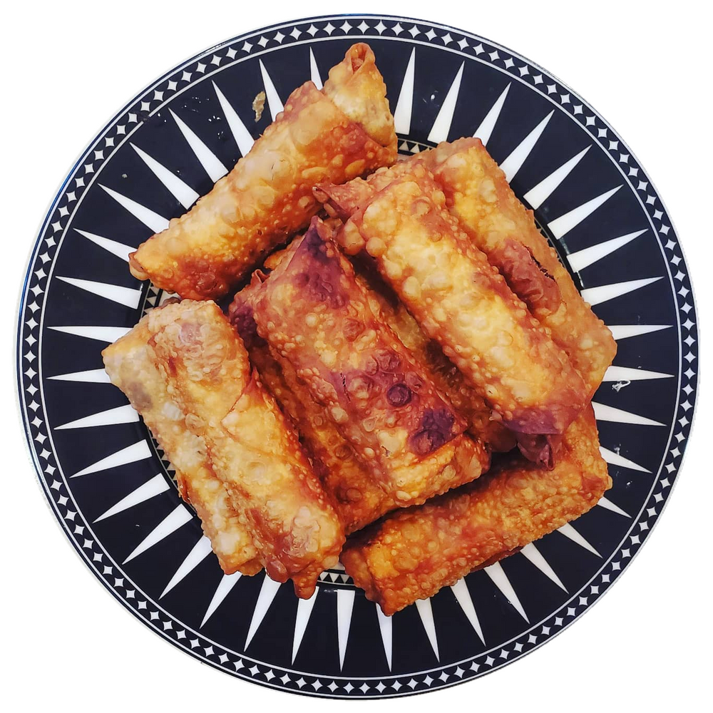 CABBAGE ONION CARROT POTATO TOFU NOODLE EGGROLLS